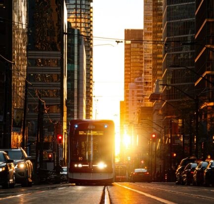 https://www.pexels.com/photo/grey-and-white-bus-during-golden-hour-3126936/